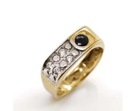 Sapphire and 9ct yellow gold ring also set with white gemstones. Marked 9k. Approx weight 2.85 grams, ring size M