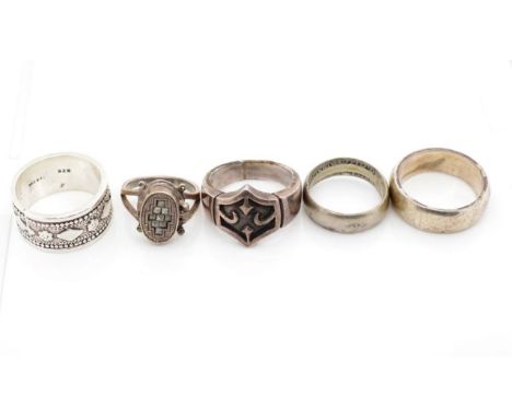 Five silver rings approx weight 40 grams, ring sizes K, O, T.