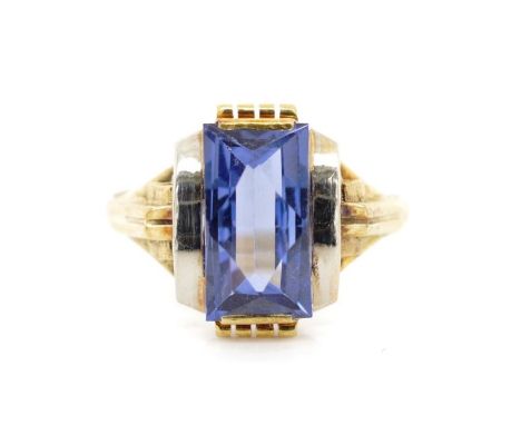 Synthetic blue spinel and 14ct gold ring marked eagle heads to shank. Approx weight 2.4 grams, ring O