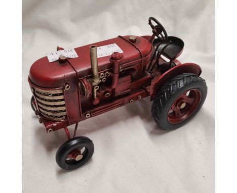 A modern tinplate model tractor