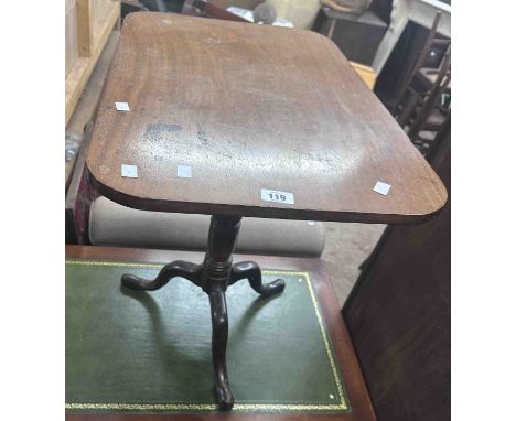 A 66cm 19th Century mahogany tilt-top pedestal table with rounded oblong top, set on ring turned pillar and tripod base