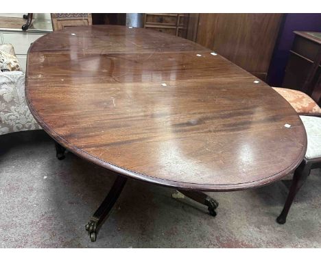 A 1.96cm vintage Martin J. Dodge Georgian style mahogany extending pedestal dining table with single leaf and table clips, se
