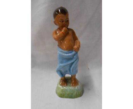 A Royal Worcester bone china Freda Doughty figurine 'Burman', depicting a young native boy