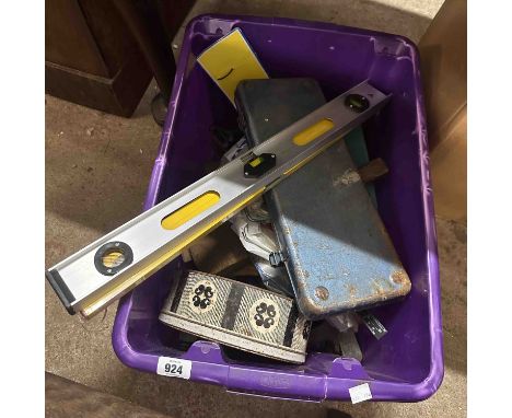 A crate containing a quantity of tools including sockets, etc.