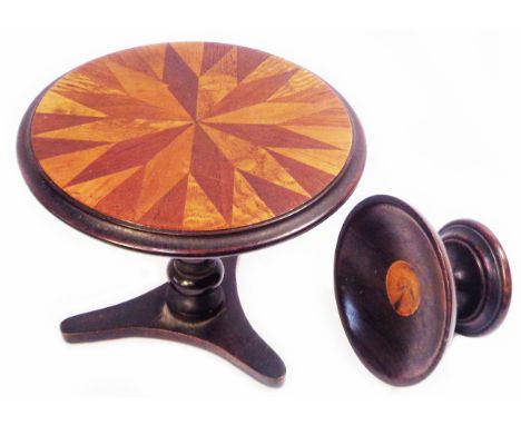 A 16.5cm diameter antique mixed wood apprentice piece pedestal table with specimen wood marquetry top, set on turned pillar a
