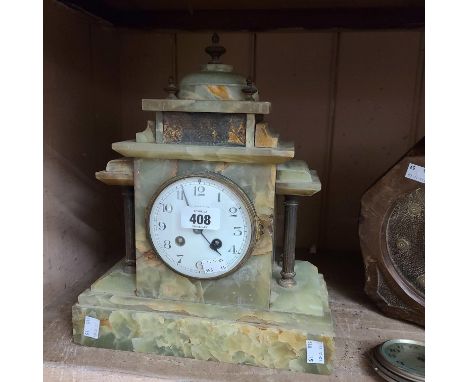 A late Victorian green onyx cased mantel clock of architectural design with dial marked for retailer Pin &amp; Webb and Frenc