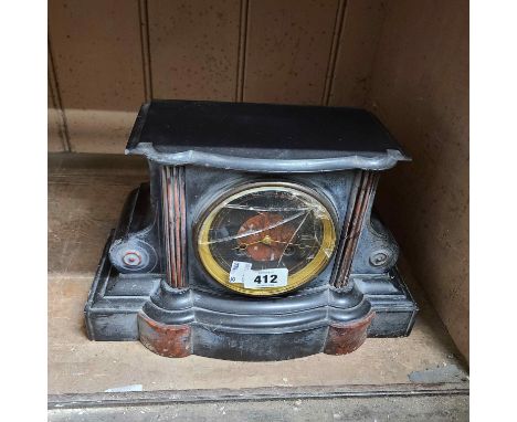 A late Victorian black slate and red marble cased mantel clock with eight day bell striking movement - glass a/f