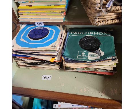 A quantity of vintage single records including The Beatles 'Hello Goodbye', The Rolling Stones 'Jumpin Jack Flash', etc.
