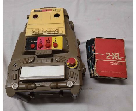 A vintage Mego 2-XL Robot Interactive Game with three 8 track tapes and instruction books