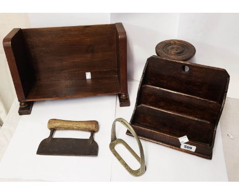 A small collection of wooden items including a book trough, letter rack, hourglass, etc.