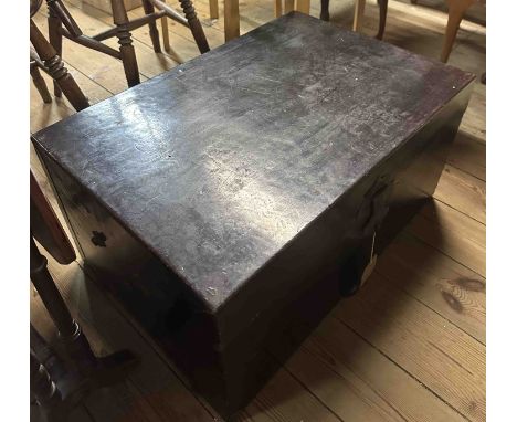 A 70cm old Oriental polished leather travelling trunk with iron latch and internal label - one handle missing