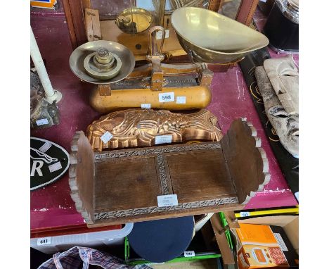 A vintage set of Avery scales and weights, a carved wood book slide and a copper jelly mould in the form of a fish