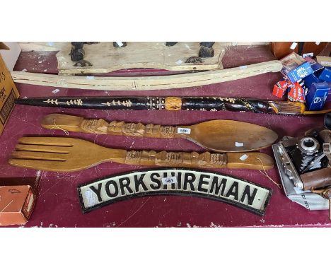 A large ornamental vintage wooden spoon and fork - sold with a decorative carved Jamaican walking stick