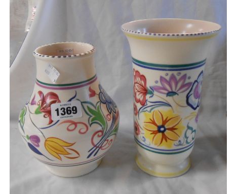 A Poole Pottery vase of baluster form with hand painted stylised decoration - sold with another similar