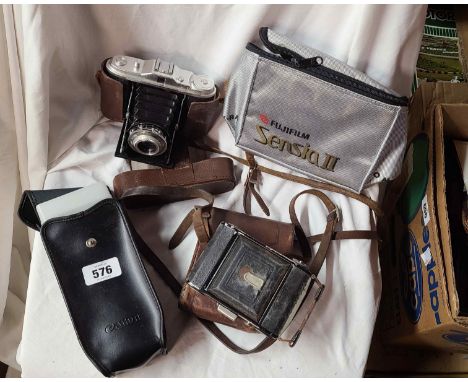 A vintage AGFA 'Isolette' camera, a Zeiss 'Ikon' camera and a Canon 550EX flash attachment, etc.