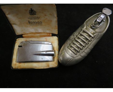 Vintage Ronson lighter together with a table lighter in the form of a football boot 