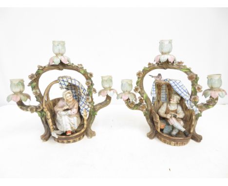 Pair of ceramic candle sticks, possibly German 