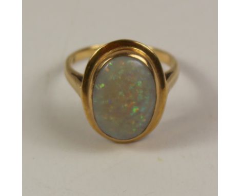 Large opal set gold ring stamped 9ct Condition Report Click here for further images, condition, auction times & delivery cost