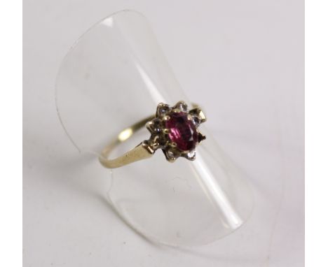 Ruby and diamond cluster ring hallmarked 9ct  Condition Report Click here for further images, condition, auction times & deli