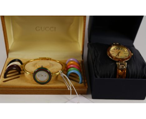 Ladies Gucci watch with interchangeable coloured bezels and  Anne Klein wristwatch with mother of pearl coloured face and tor