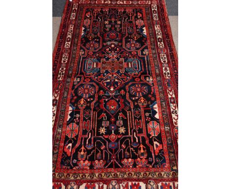 Persian Hamadan red and blue ground rug carpet, 320cm x 161cm Condition Report Click here for further images, condition, auct