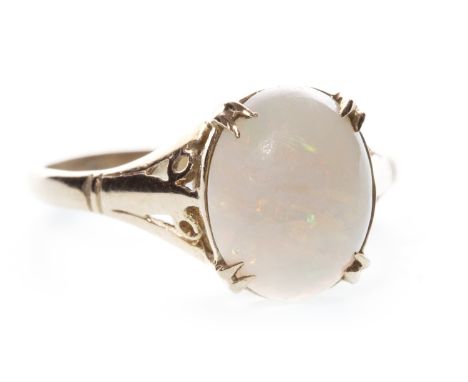 OPAL RING, set with a four claw mounted oval opal, personal inscription to interior of the shank, marks worn, size K, 1.6g