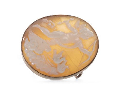 LATE NINETEENTH CENTURY CAMEO BROOCH, set with an oval section of shell carved to depict Cupid on one leg, bow and arrow in h