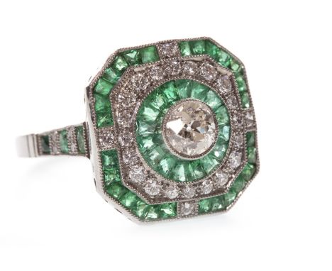 EMERALD AND DIAMOND RING, in the art deco style, the octagonal bezel 15.5mm wide and with a central round brilliant cut diamo