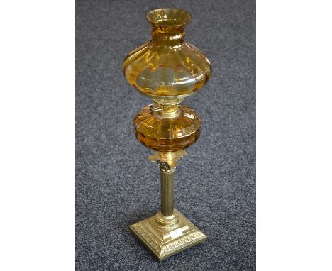 A Victorian brass Corinthian column oil lamp, amber glass reservoir and shade, twin burner, square base, 72.5cm high (part co