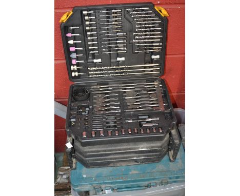 Hand tools including an extensive drill and bit set; a tap and die set; socket set; chisels; hammers, saws etc.; a bench vice