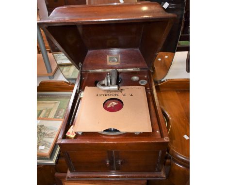 A vintage HMV table top wind-up gramophone record player 