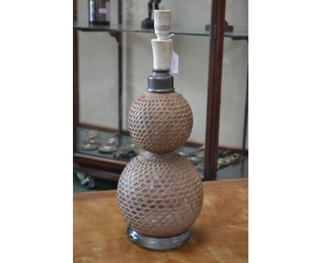 A 19th century double gourd wicker and glass soda siphon, converted to table lamp