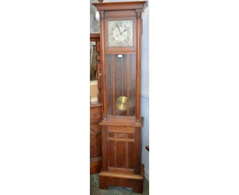 A 1930s oak and mahogany longcase clock, silvered dial, Roman numerals, glazed door to trunk 