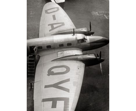Stöcker, Alex -- Heinkel He 111 plane and Fokker plane at Tempelhof Airport, Berlin. 1935. 2 vintage ferrotyped gelatin silve