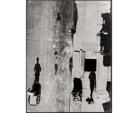 Umbo -- "Unheimliche Straße". 1928/printed 1977. Gelatin silver print on Agfa paper. 30 x 23 cm. Signed, editioned 64/100 and