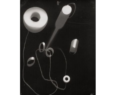 Kozman, Myron -- Photogram. Circa 1935. Vintage gelatin silver print. 25 x 20 cm. Annotated in pencil on the verso.Myron Kozm