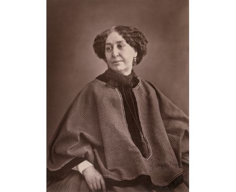 Nadar -- Portrait of George Sand. 1864/printed before 1876. Woodburytpe. 23,1 x 17,1 cm (29,7 x 22,5 cm). Signed by George Sa