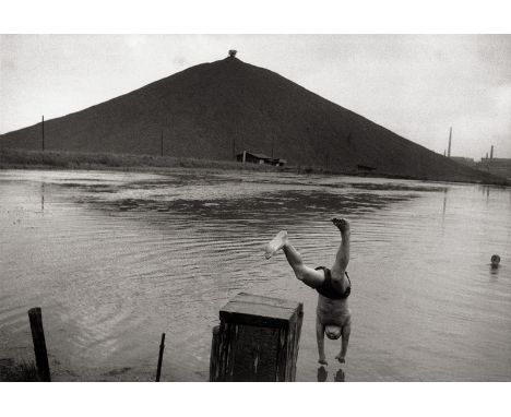 Kolář, Viktor -- Ostrava. 1967. Vintage ferrotyped gelatin silver print. 18  x 24 cm. Photographer's stamp, titled and dated 