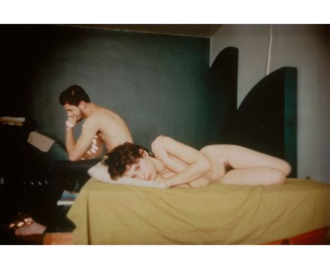 Goldin, Nan -- "J. and Richard on the bed, Chicago" (Couple in Bed, Chicago), from the series "The Ballad of Sexual Dependenc