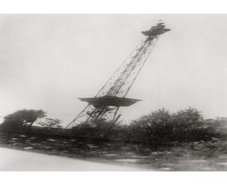 Ruge, Willi -- From the series "On the Avus with Caracciola". 1931. Vintage ferrotyped gelatin silver print. 14 x 20,3 cm (17