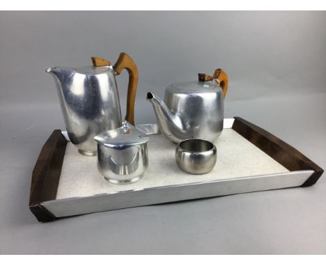 PIQUOT WARE THREE PIECE TEA SERVICE, on tray, along with silver plated candle holders, a novelty nut cracker modelled as a sq