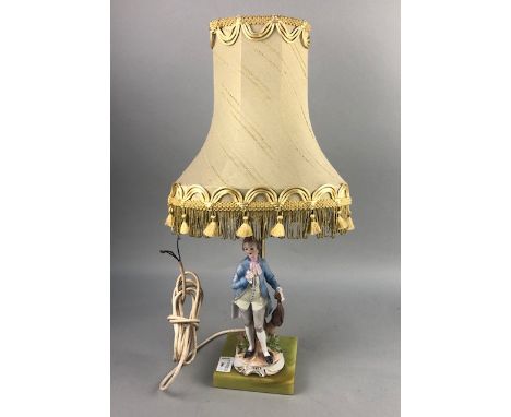 FIGURAL TABLE LAMP, on an onyx base, with cream shade, 55cm high overall, along with two other decorative table lamps (3)