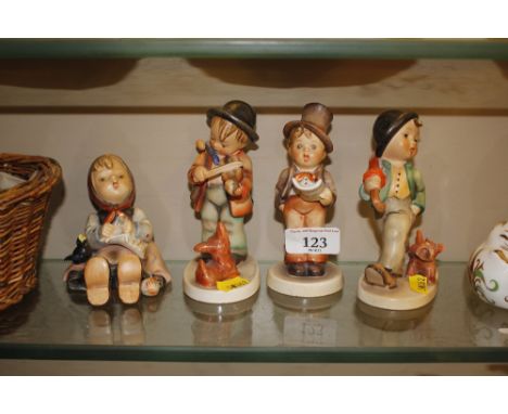 Four Goebel figures