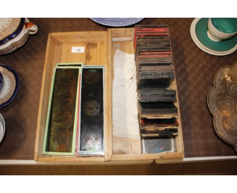 A collection of Magic Lantern slides in box