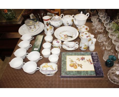 A quantity of Royal Worcester "Evesham" patterned dinnerware; and a quantity of white glazed dinnerware etc. 