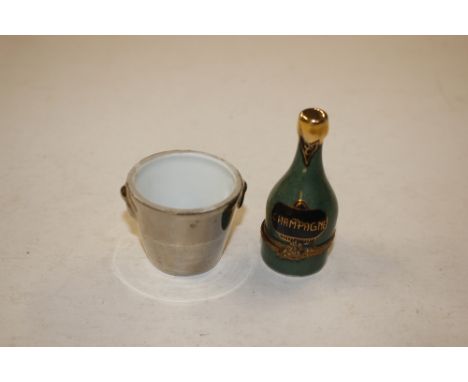 A Limoges porcelain miniature champagne bottle, patch box and a miniature Limoges ice bucket 