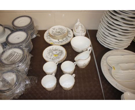 A quantity of Royal Worcester "Pheasant" pattern teaware
