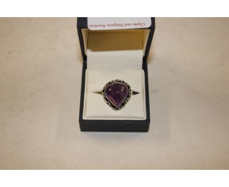 A boxed silver marked 925 amethyst ring