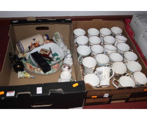 Two boxes of miscellaneous items to include a Spanish porcelain figure of a lady, a continental porcelain figure of a Bluetit