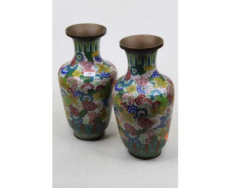 A pair of Chinese cloisonne enamel vases, of baluster form, each decorated with chrysanthemums, h.32cmCondition report: One v